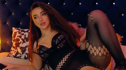 AlmaRhea is a webcam girl who likes to dress in flamboyant