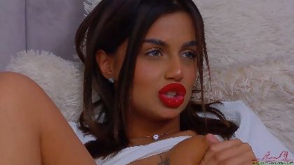 LaraTay is a webcam girl that loves playing with her hairy pussy and big silicon tits.